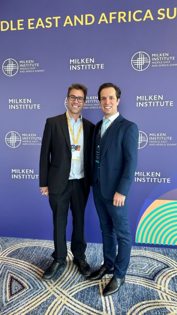 Zachary Cefaratti and Etoro Founder Yoni Assia at Milken Institute